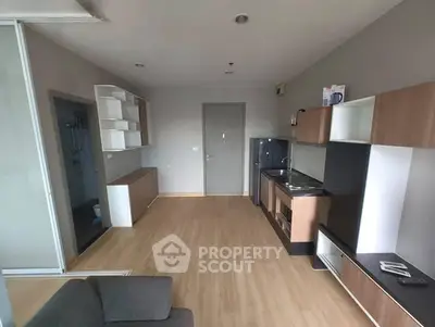 Modern apartment interior with sleek kitchen and open layout