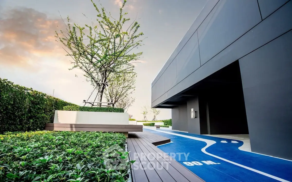 Modern rooftop with sleek design and lush greenery, perfect for relaxation and leisure.