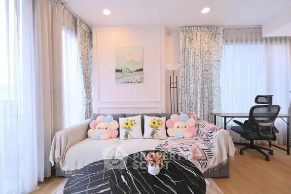 Charming living room with cozy sofa, floral cushions, and elegant decor