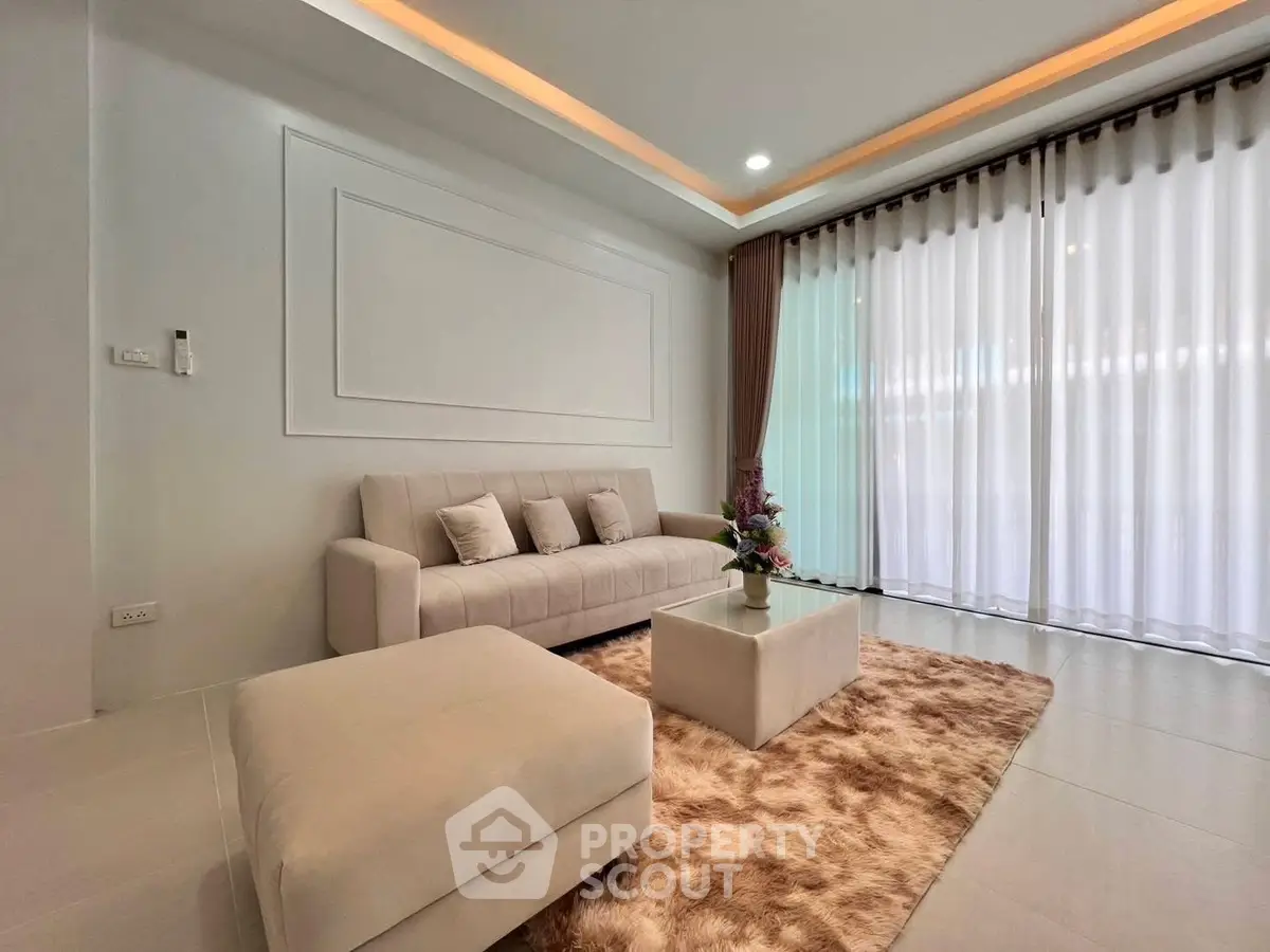 Elegant living room with plush sofa and modern decor