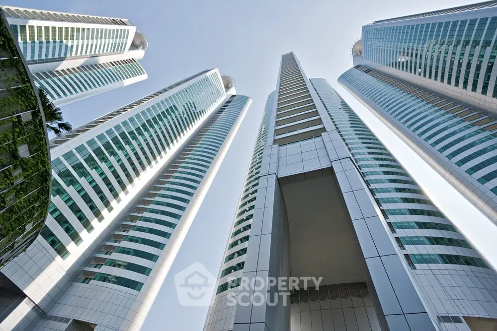 Stunning modern skyscrapers with sleek architecture and glass facades reaching towards the sky.