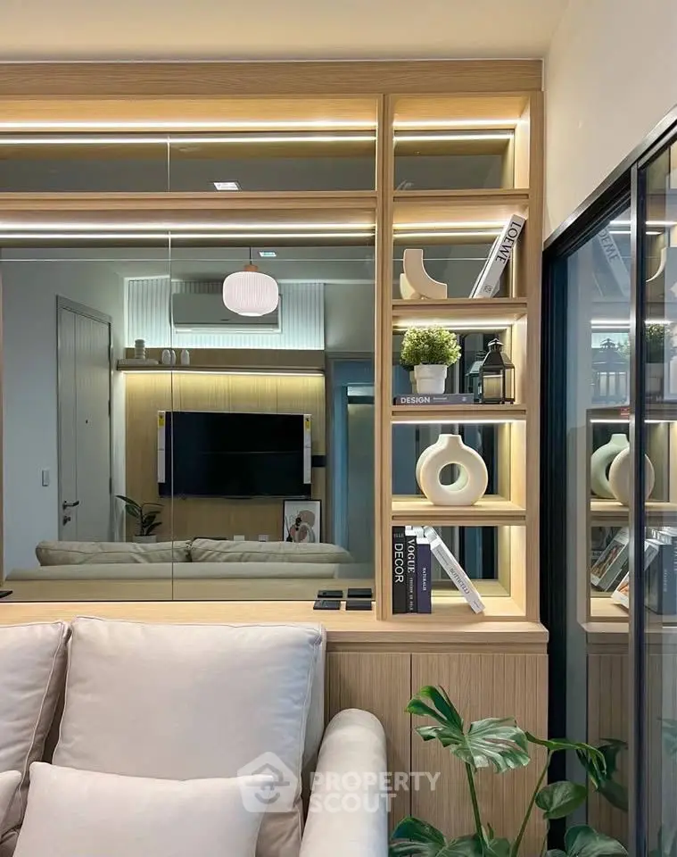 Modern living room with stylish shelving and cozy seating