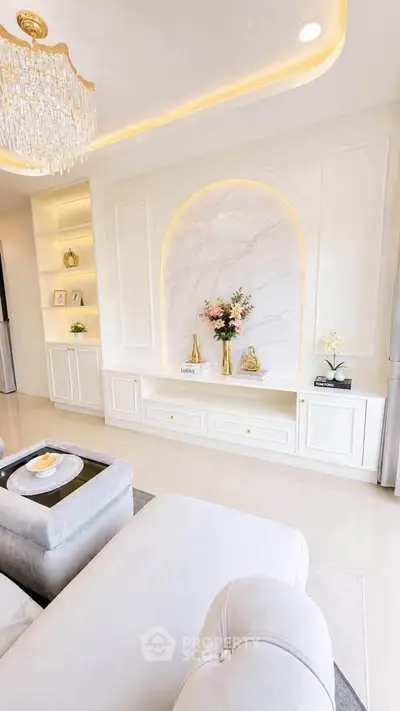 Luxurious living room with elegant decor and plush seating in a modern apartment.