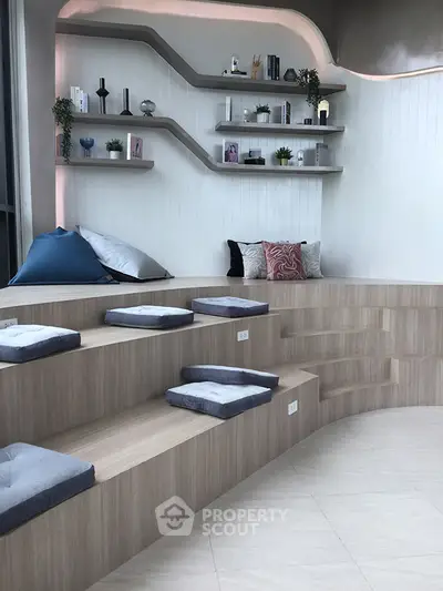 Modern study area with tiered seating and stylish shelves