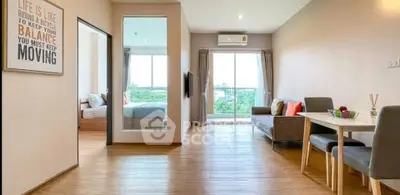 Spacious modern living room with wooden flooring and natural light