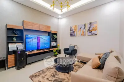 Modern living room with stylish furniture and entertainment center