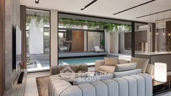 Luxurious living room with pool view and modern interior design.