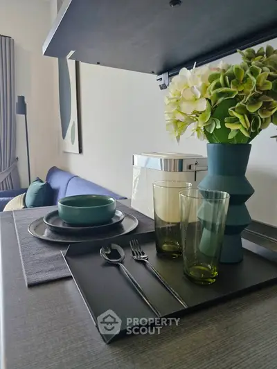 Modern living room with stylish decor and elegant table setting