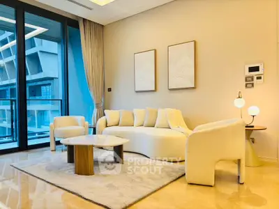 Luxurious modern living room with elegant furniture and large windows offering a stunning view.