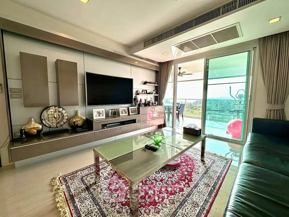 Luxurious living room with modern decor and stunning balcony view