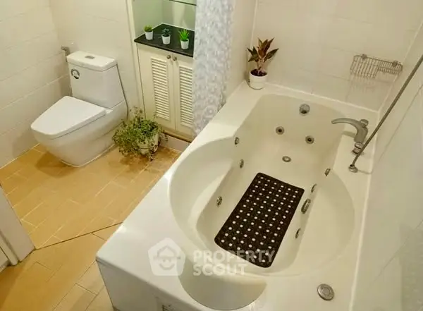 Modern bathroom with jacuzzi tub and stylish decor