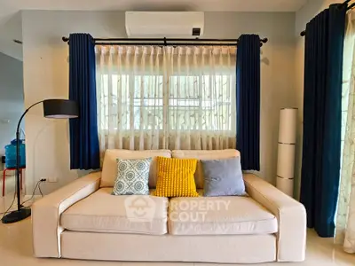 Cozy living room with stylish sofa and modern decor