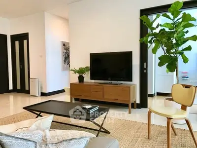 Stylish living room with modern decor and indoor plants
