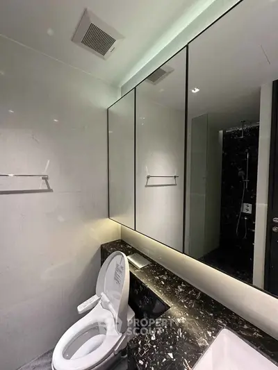 Modern bathroom with sleek design and marble countertop