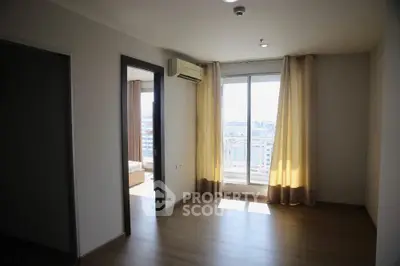 Bright apartment interior with balcony view and modern flooring