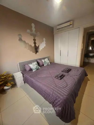 Modern bedroom with stylish decor and air conditioning