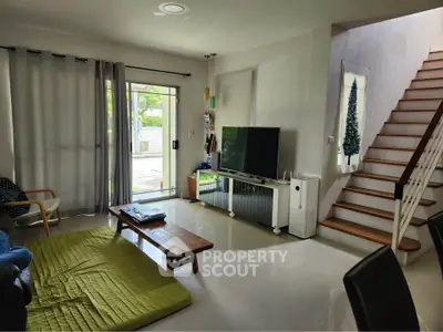 Spacious living room with modern decor and natural light