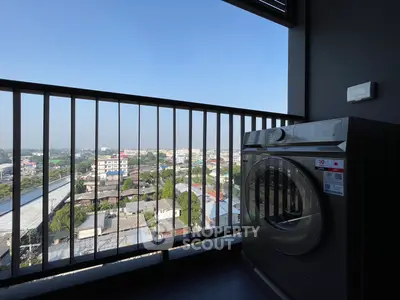 Modern balcony with washing machine and panoramic city view