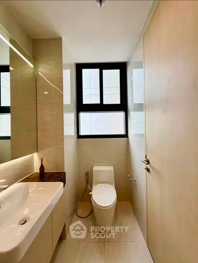 Modern bathroom with sleek fixtures and natural light
