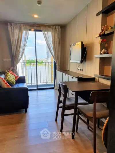 Modern living room with balcony view and stylish decor