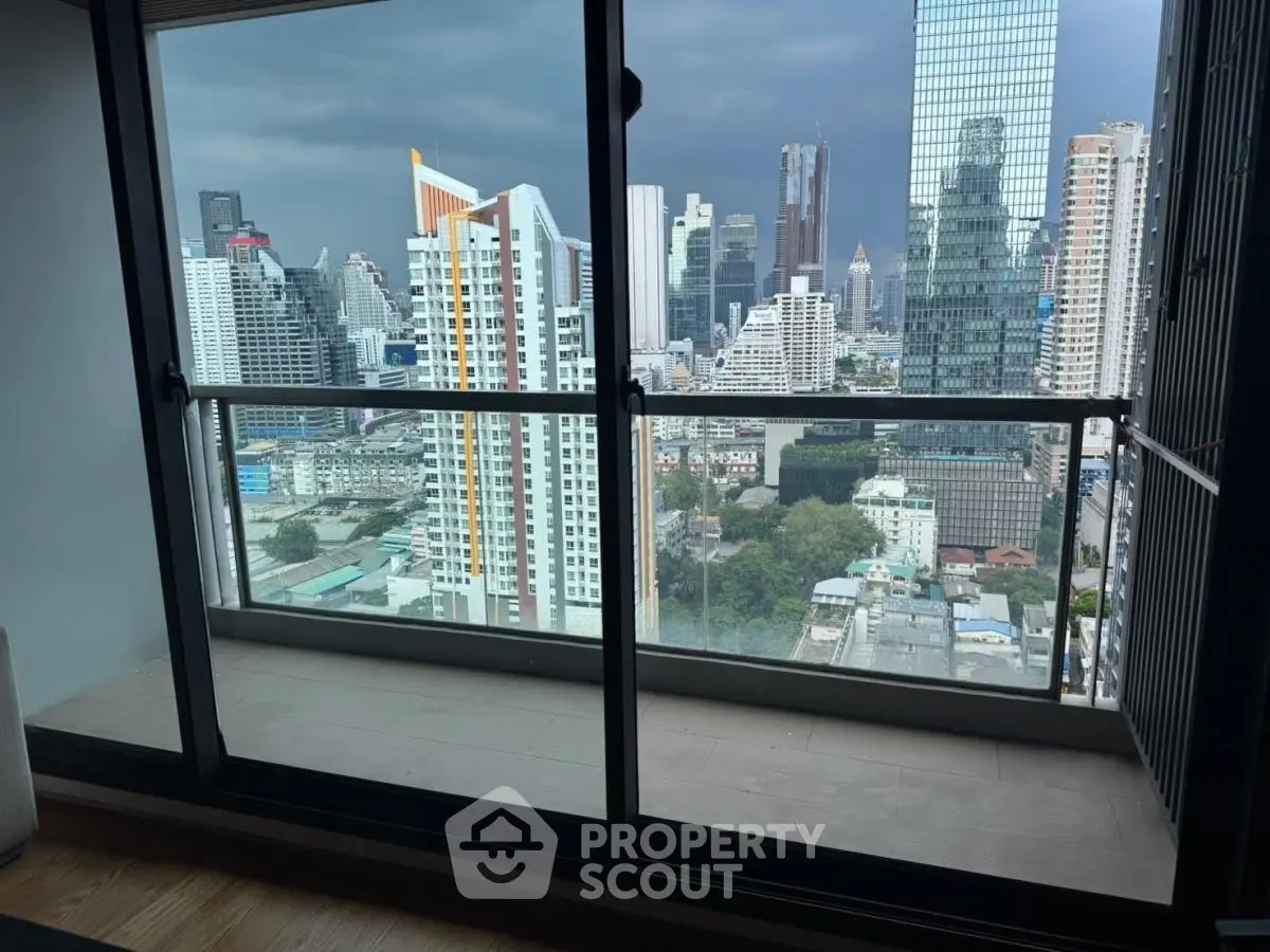 Stunning cityscape view from a modern high-rise balcony, perfect for urban living enthusiasts.