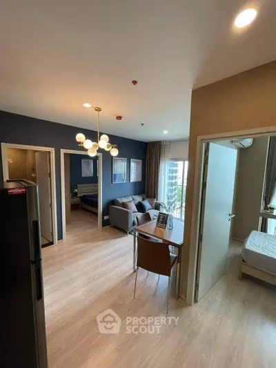 Modern apartment interior with open living room and stylish lighting