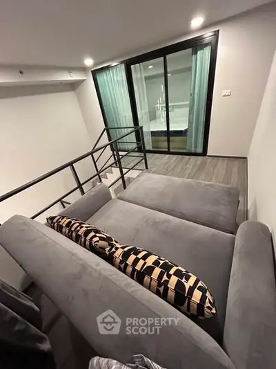 Modern living room with sleek design and large windows