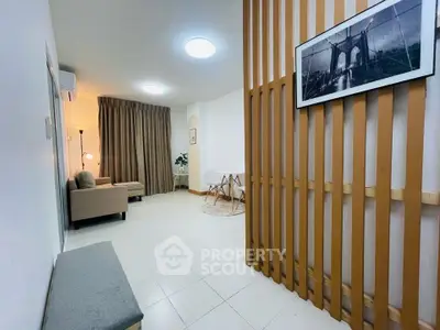 Spacious living room with modern decor and stylish partition wall