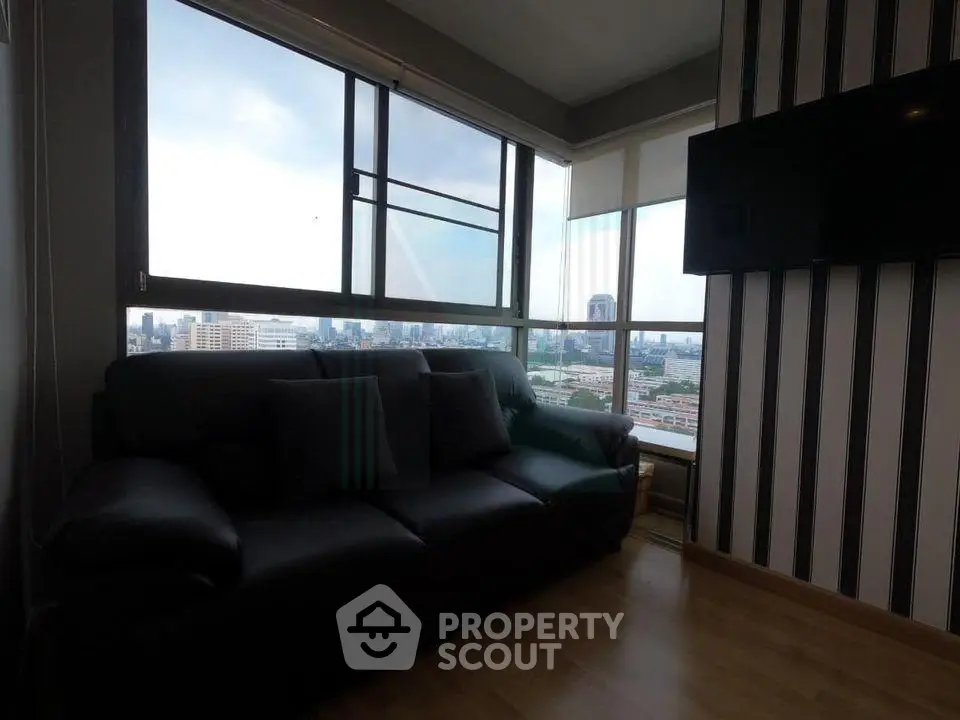 Modern living room with city view and stylish decor