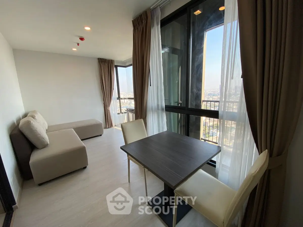 Modern living room with panoramic city view and elegant furnishings