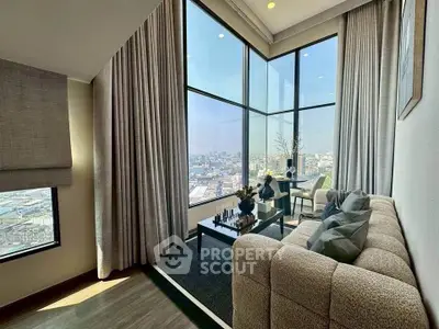 Luxurious corner living room with floor-to-ceiling windows offering stunning city views.