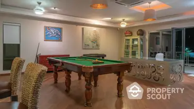 Luxurious game room with pool table and stylish decor in modern home