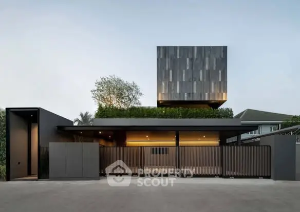 Modern architectural home with sleek design and lush rooftop garden.