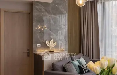 Elegant living room with modern decor and cozy seating area.