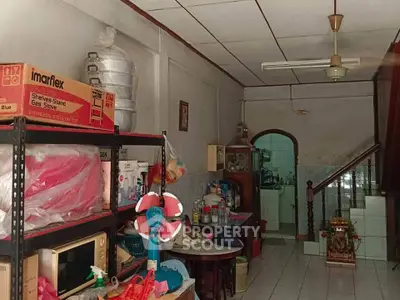 Cozy kitchen with traditional decor and ample storage space in a charming home.