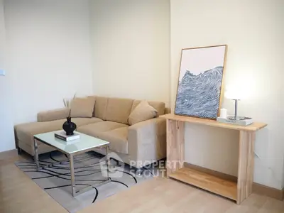 Modern living room with cozy beige sofa and stylish decor