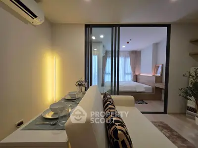 Modern studio apartment with stylish decor and cozy bedroom