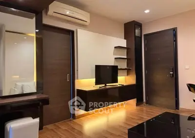 Modern living room with sleek furniture and ambient lighting