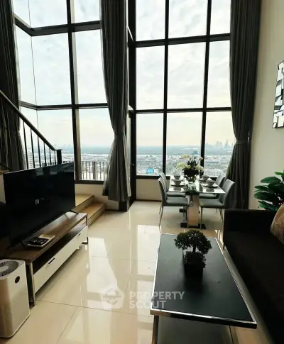 Luxurious high-rise living room with stunning city view and elegant decor