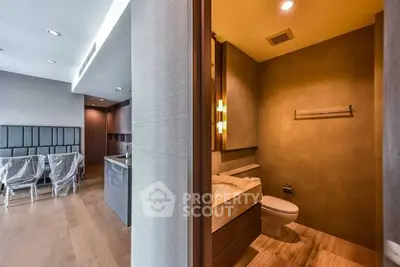 Modern apartment interior with sleek kitchen and stylish bathroom design.