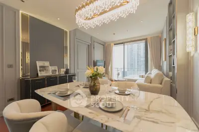 Luxurious dining area with marble table and elegant chandelier in modern apartment