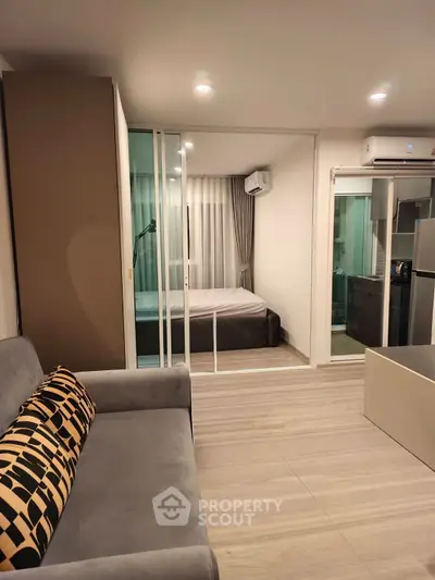 Modern studio apartment with open layout and stylish furnishings