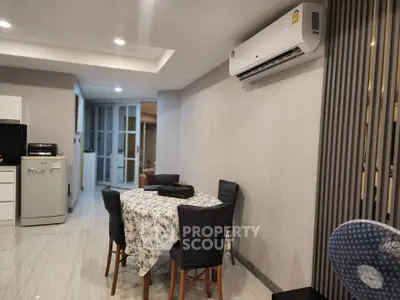 Modern dining area with air conditioning and stylish decor