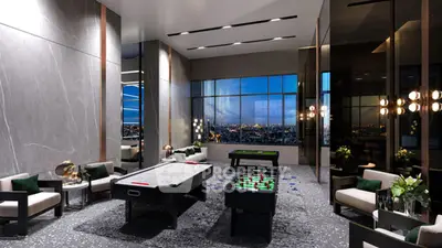Luxurious game room with stunning city view, featuring air hockey and foosball tables, elegant seating.