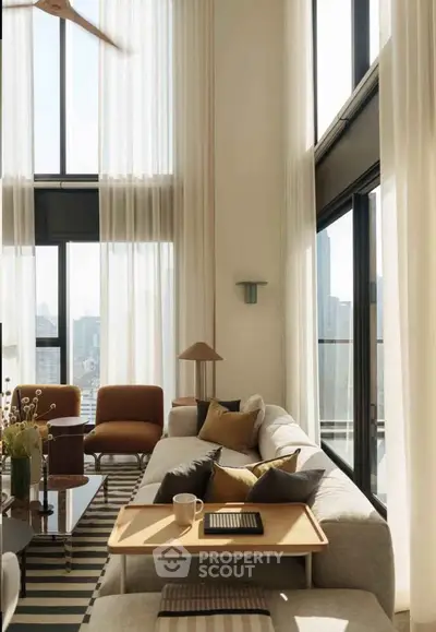 Luxurious modern living room with high ceilings and panoramic city views, featuring elegant furniture and natural light.