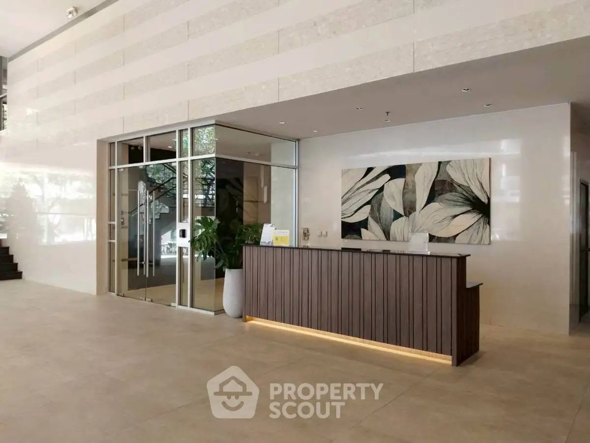 Elegant building lobby with modern reception desk and stylish decor