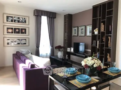 Stylish living room with modern decor and elegant dining setup