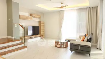 Spacious modern living room with stylish furniture and natural light