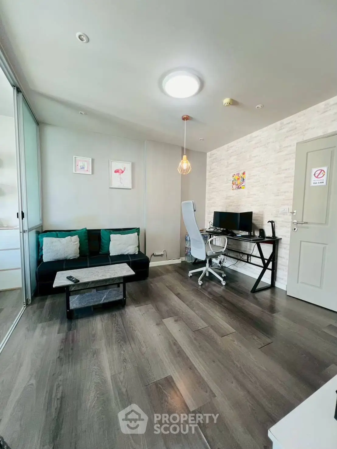 Modern study room with sleek desk and cozy seating area