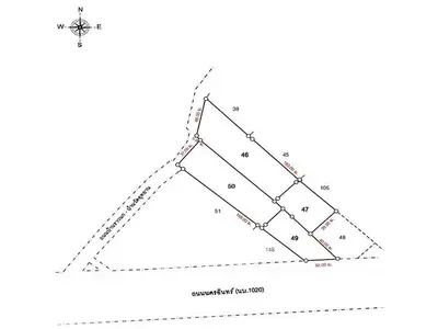 Detailed land plot map with parcel numbers and boundary lines for real estate development.